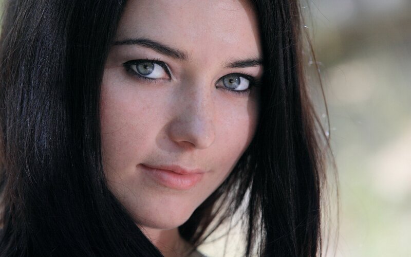 Woman with Dark Hair — Photograph, Green