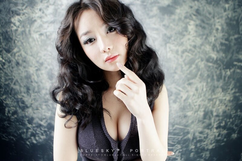 woman with dark hair posing