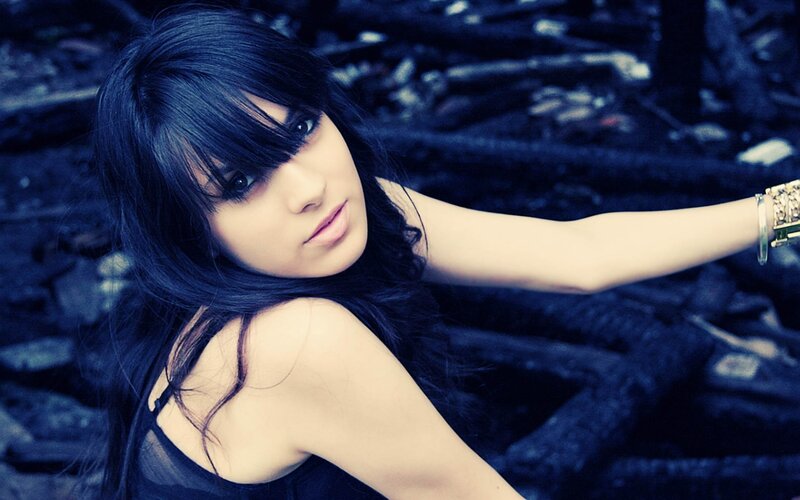 woman with dark hair posing