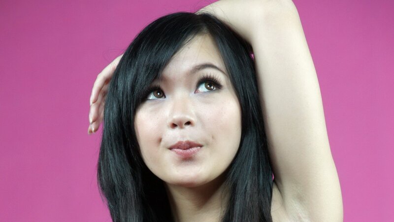 woman with dark hair posing