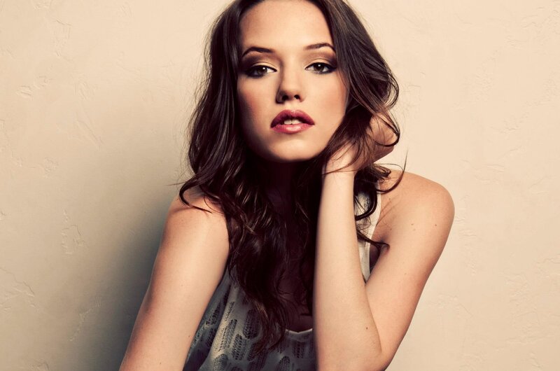 woman with dark hair posing