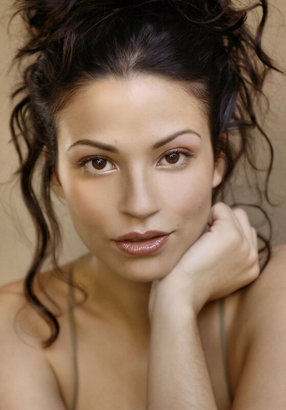 woman with dark hair posing