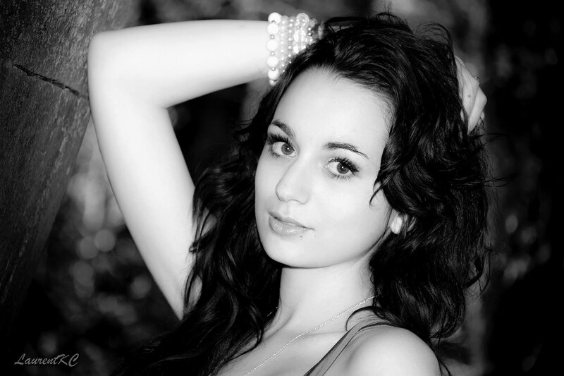 woman with dark hair posing