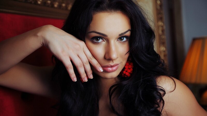 woman with dark hair posing