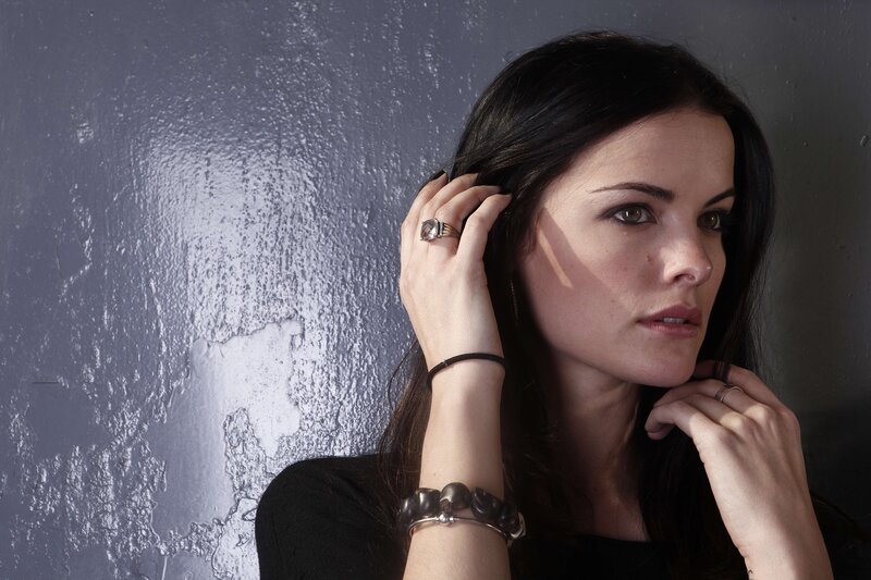 woman with dark hair posing