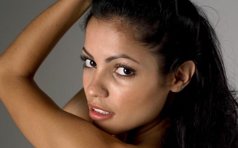 woman with dark hair posing