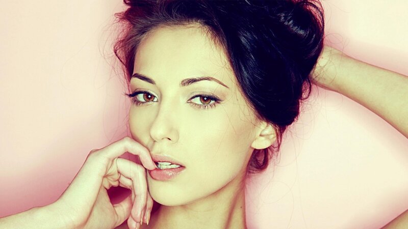woman with dark hair posing