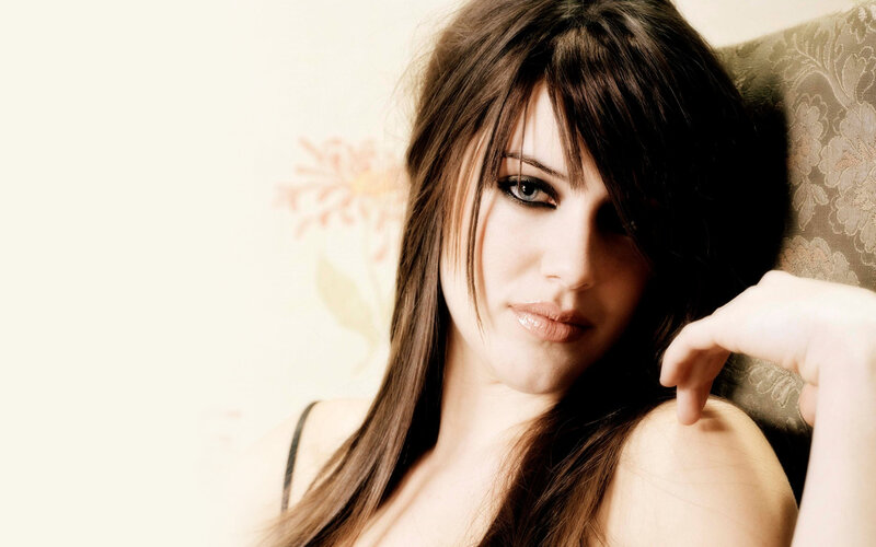 woman with dark hair posing