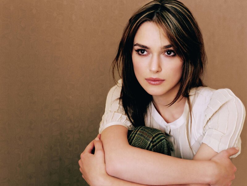 woman with dark hair posing