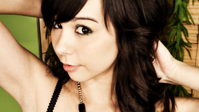 woman with dark hair posing