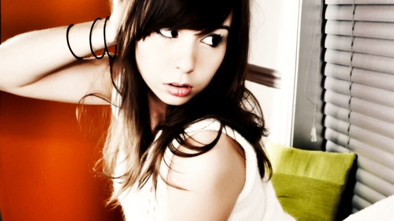 woman with dark hair posing