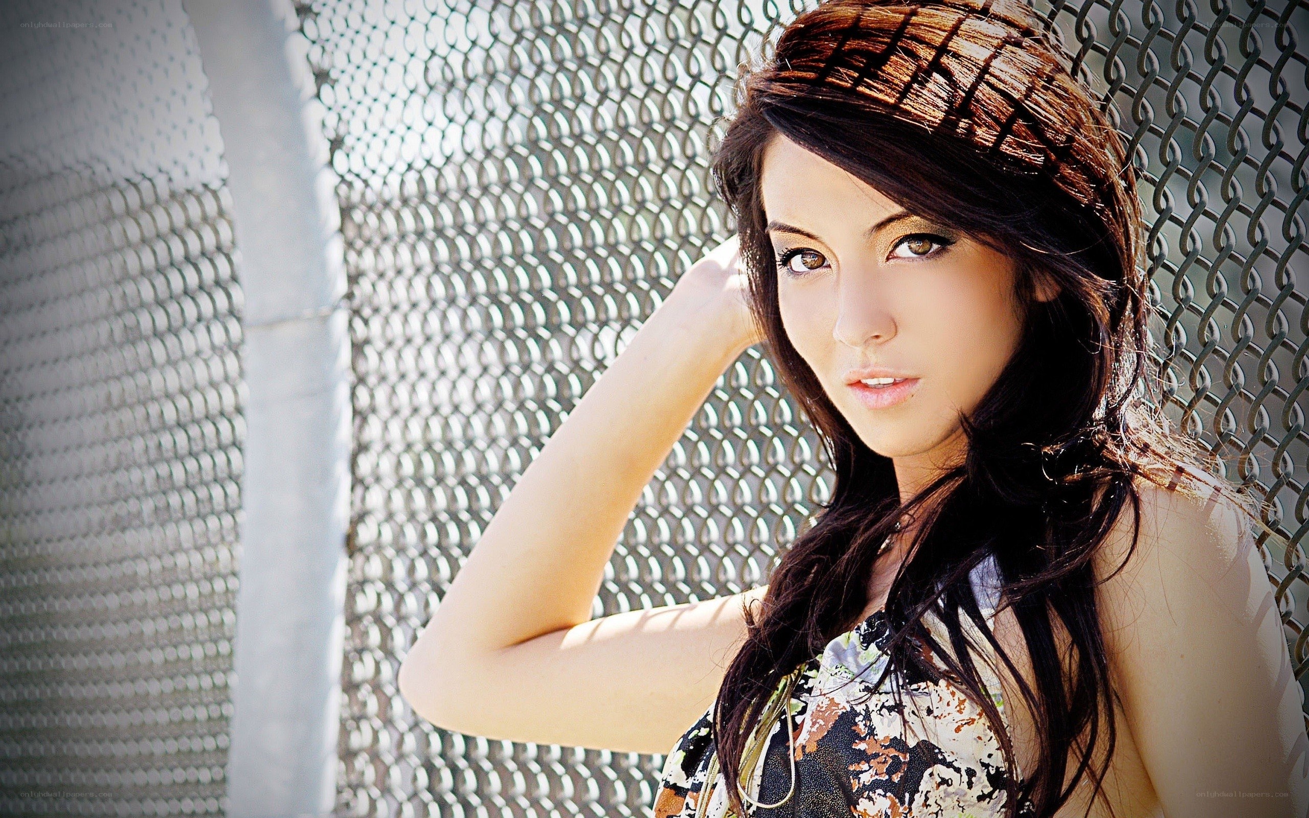 woman with dark hair posing