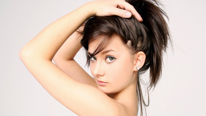woman with dark hair posing