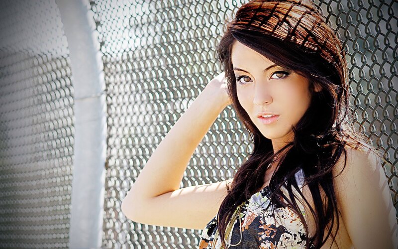 woman with dark hair posing