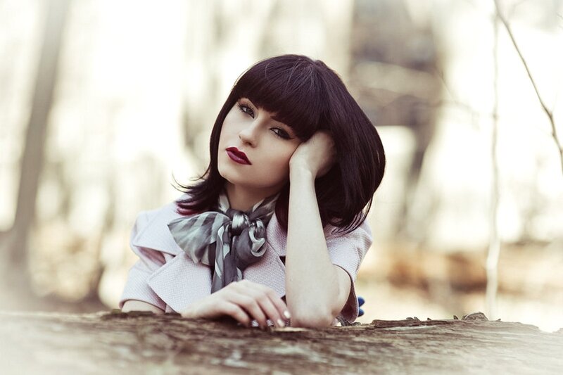 woman with dark hair resting
