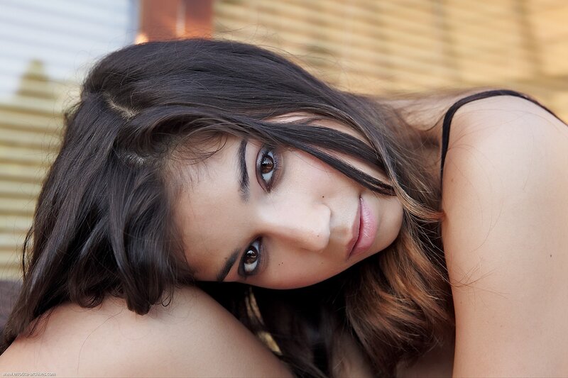 woman with dark hair resting