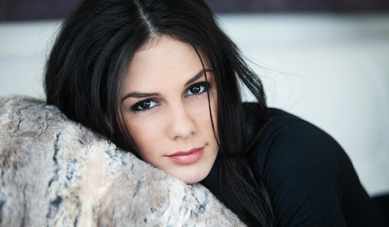woman with dark hair resting