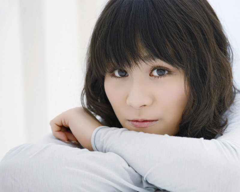 woman with dark hair resting
