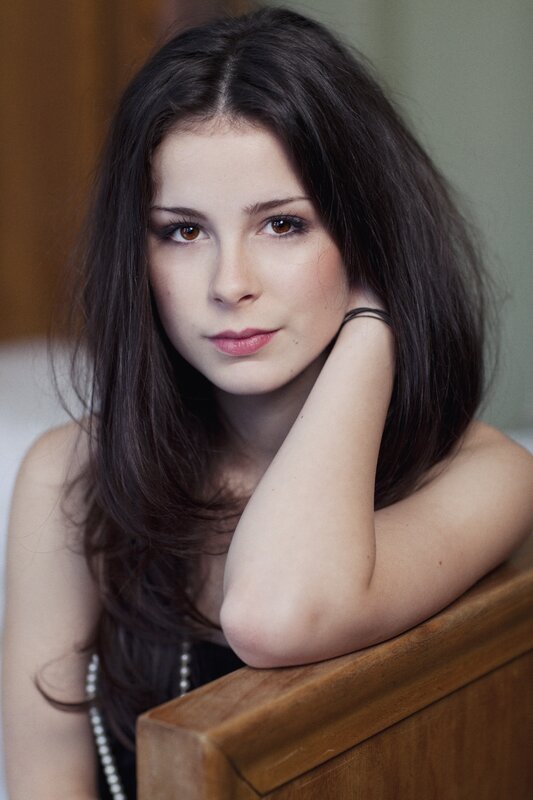 woman with dark hair resting
