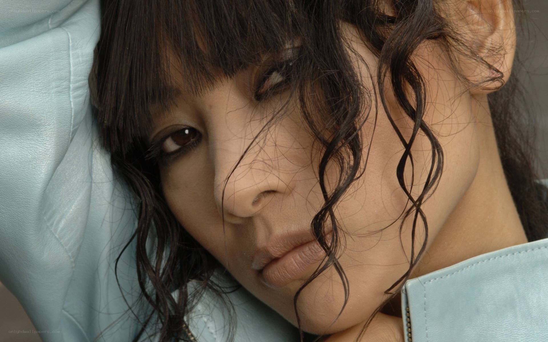 woman with dark hair resting