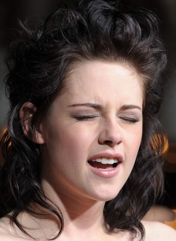 woman with dark hair singing