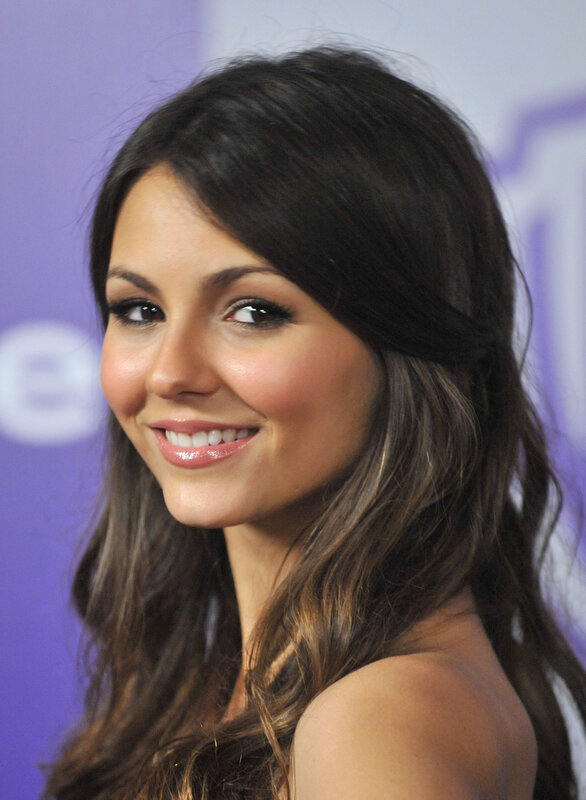 woman with dark hair smiling