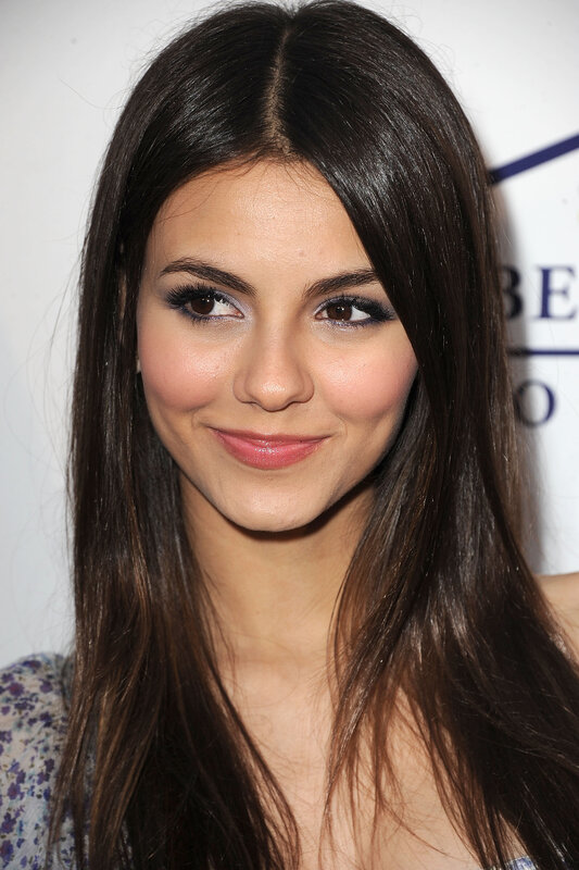 woman with dark hair smiling