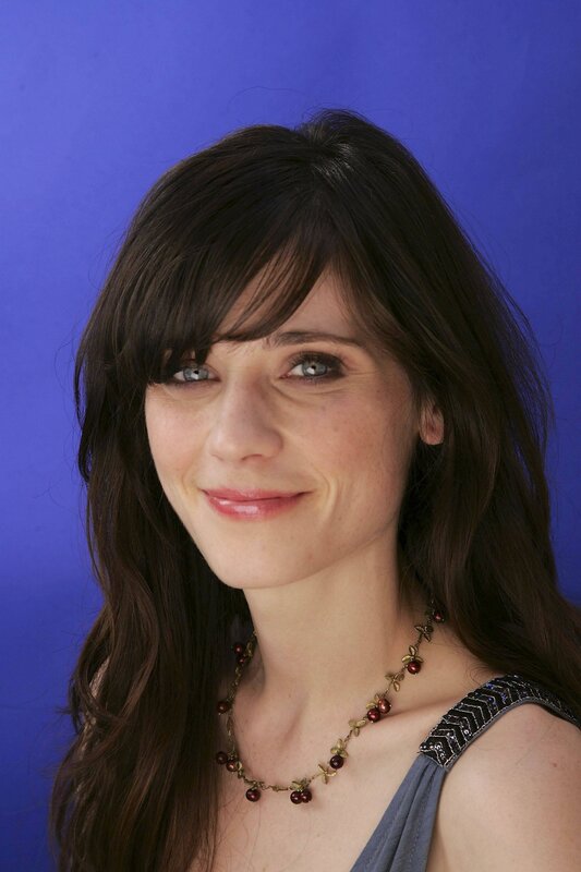 woman with dark hair smiling