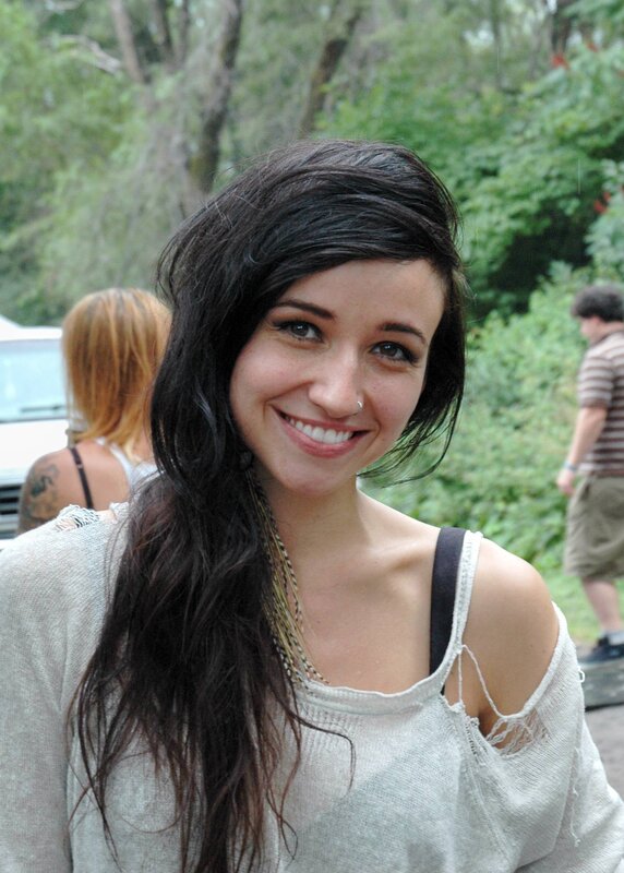 woman with dark hair smiling