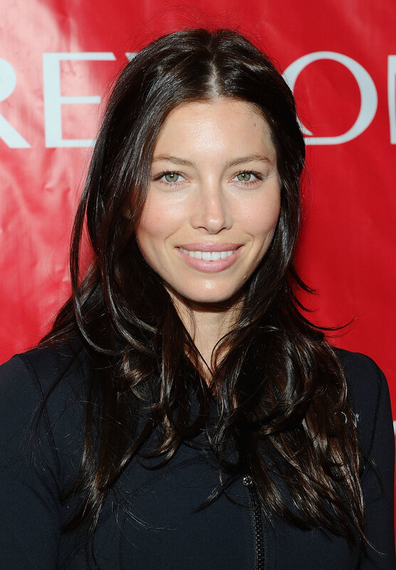 woman with dark hair smiling