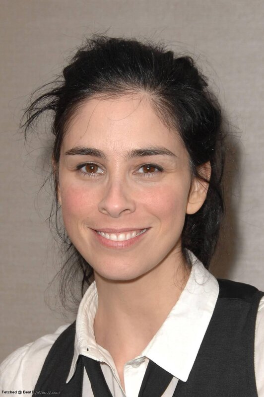 woman with dark hair smiling