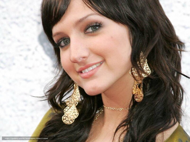 woman with dark hair smiling