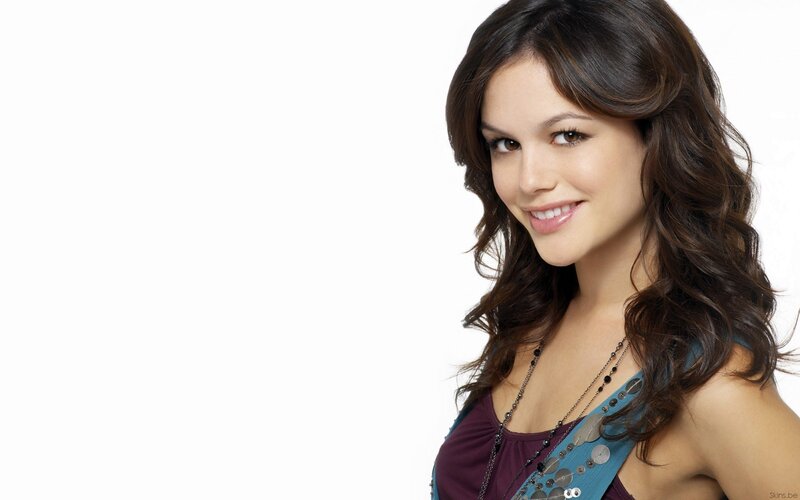 woman with dark hair smiling