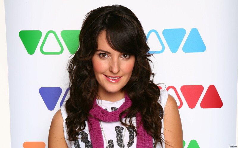 woman with dark hair smiling