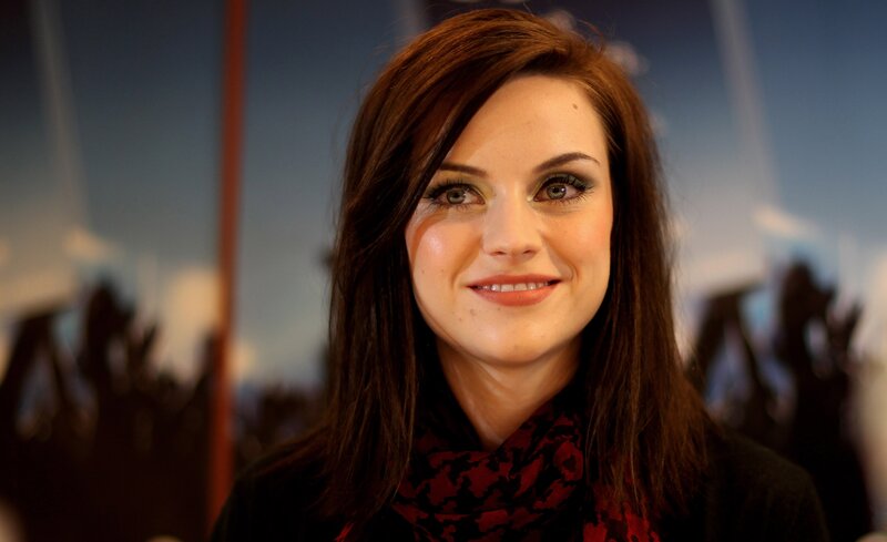 woman with dark hair smiling