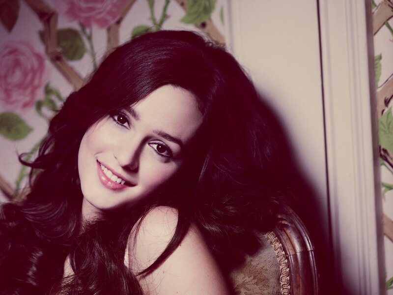 woman with dark hair smiling
