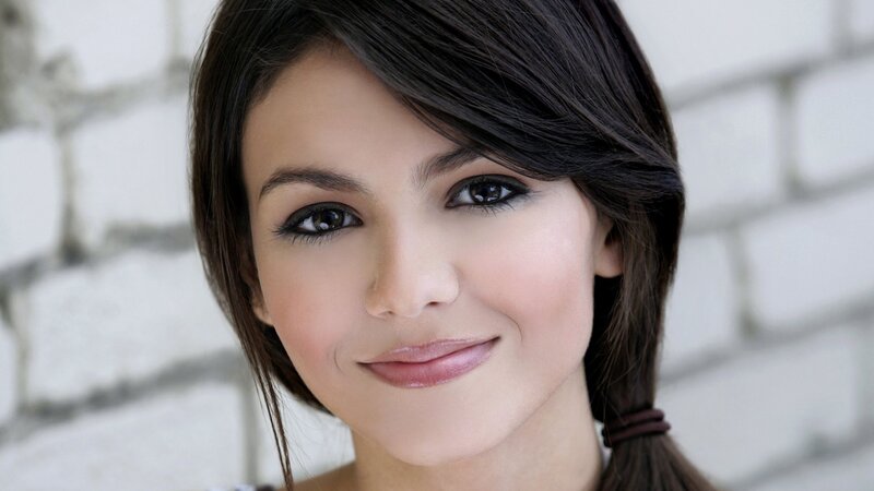 woman with dark hair smiling
