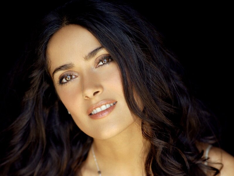 woman with dark hair smiling