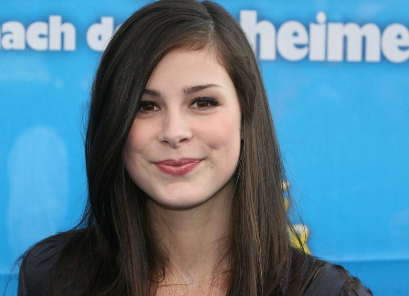 woman with dark hair smiling