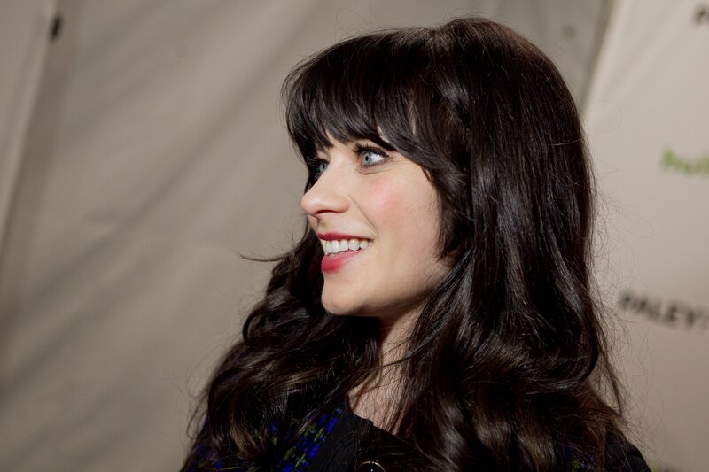 woman with dark hair smiling