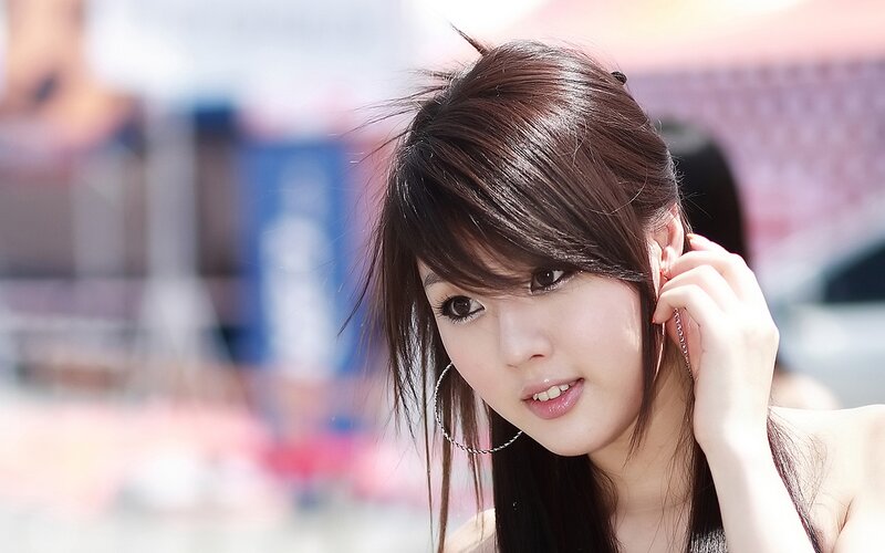 woman with dark hair smiling