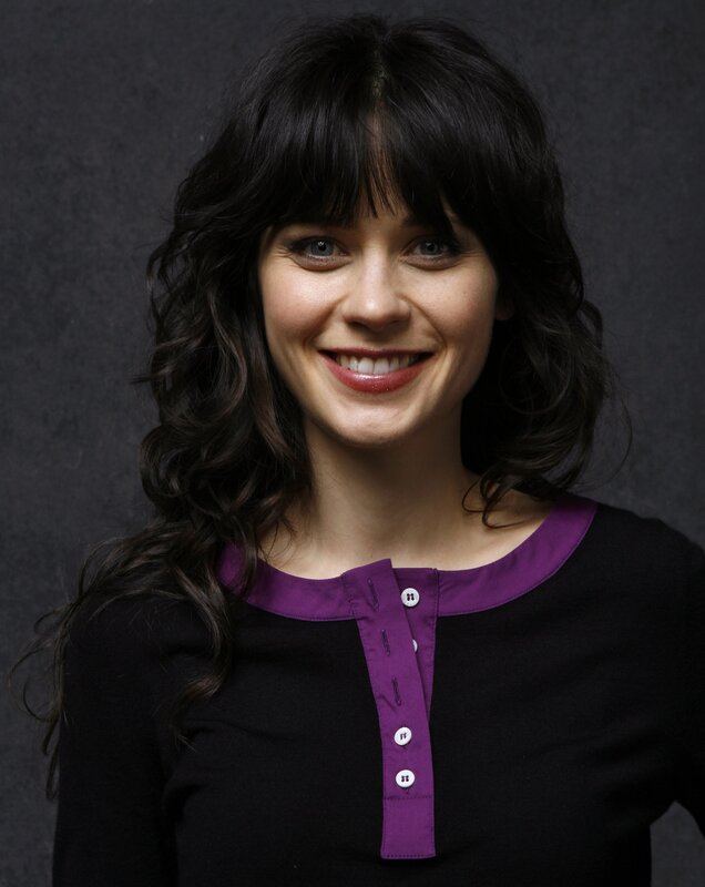 woman with dark hair smiling