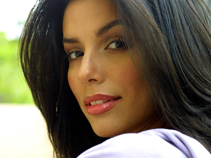 woman with dark hair smiling