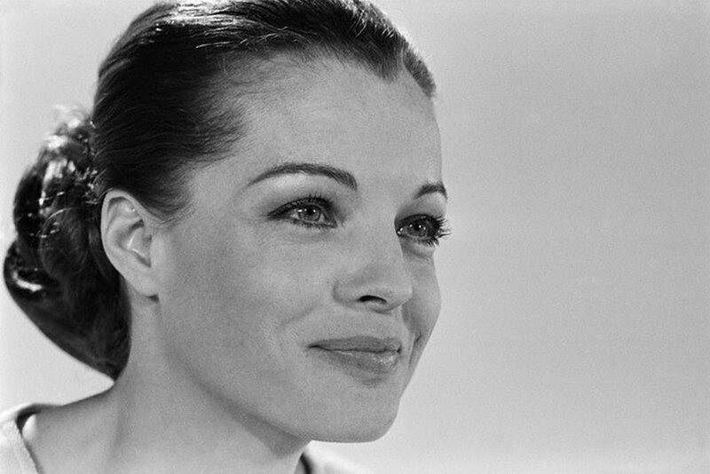 woman with dark hair smiling