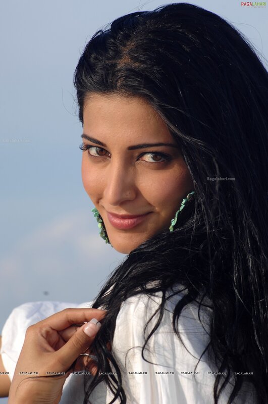 woman with dark hair smiling