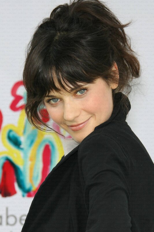 woman with dark hair smiling