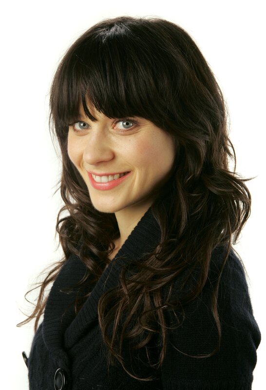 woman with dark hair smiling