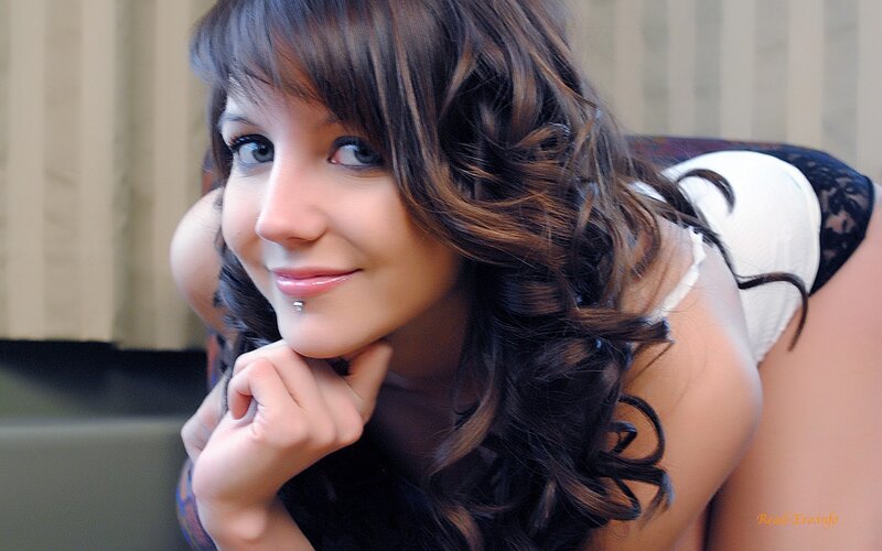 woman with dark hair smiling
