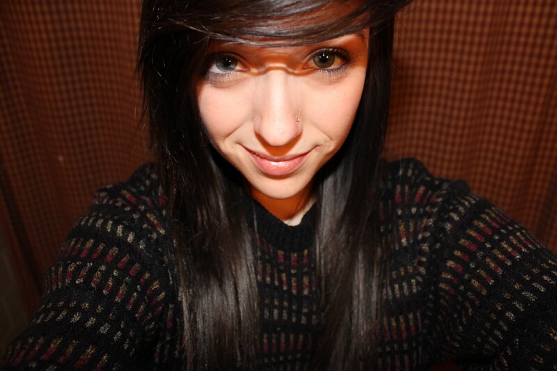 woman with dark hair smiling