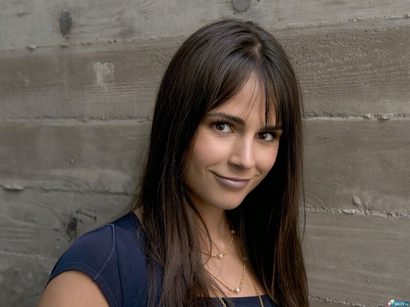 woman with dark hair smiling